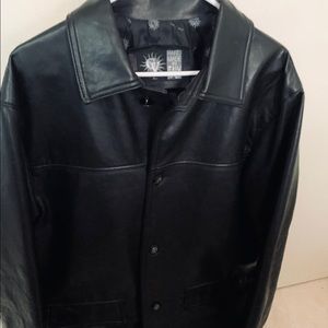 Made it Italy Mens long leather soft jacket/coat.  This is brand new with tags.